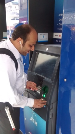 Jatin Shah, a corporate executive using CITIBANK Talking ATM placed at a Mumbai Mall